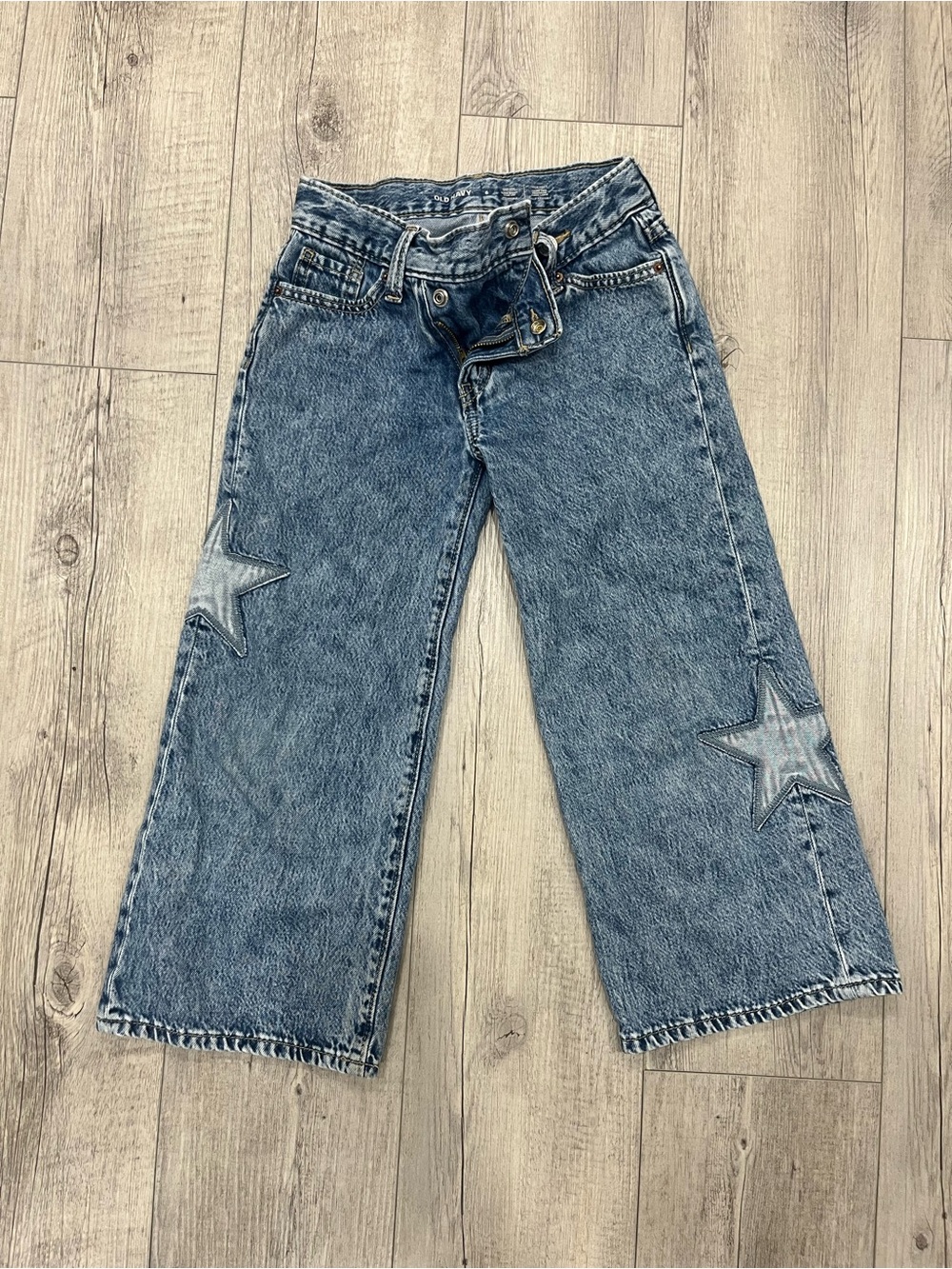 Old Navy Light Blue Wide Leg Jeans with Star Appliqués.